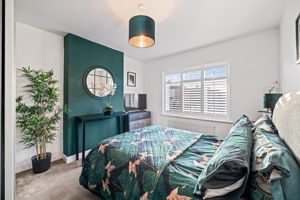 Bedroom One- click for photo gallery